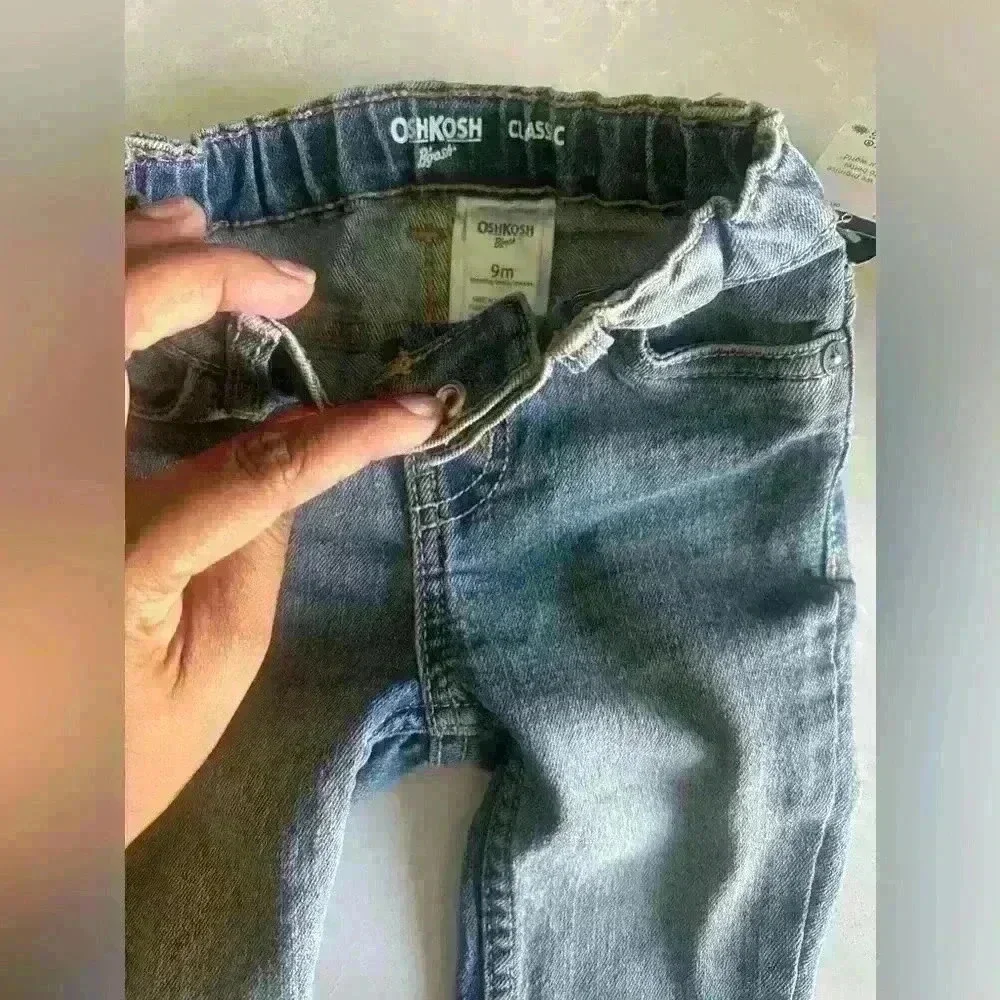 Brand new OshKosh dark blue jeans